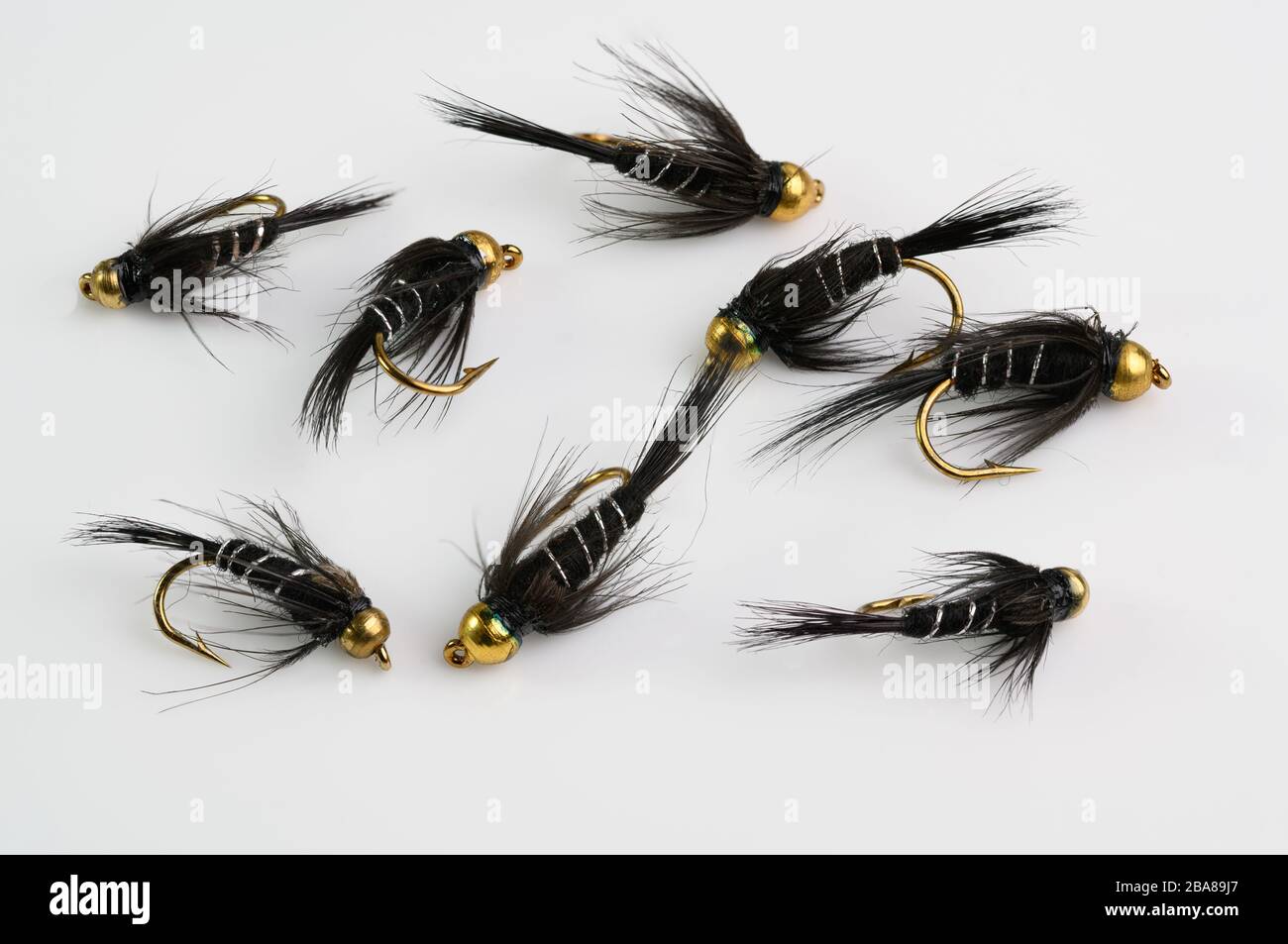 Selection of Black Gold bead head Nymphs fly fishing Flies Stock Photo -  Alamy