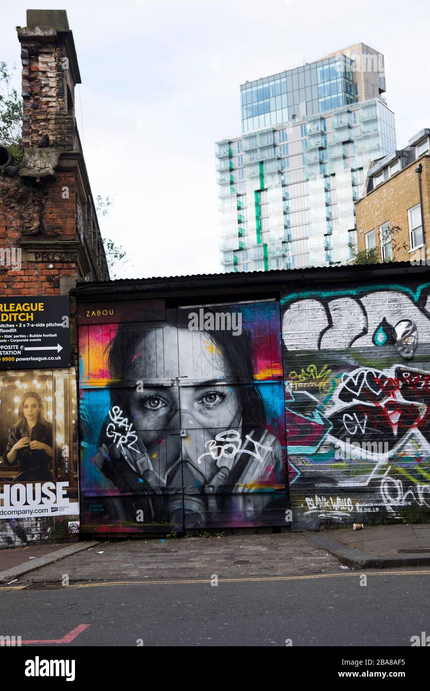 Street art in Brick lane. Graffiti in East London Stock Photo