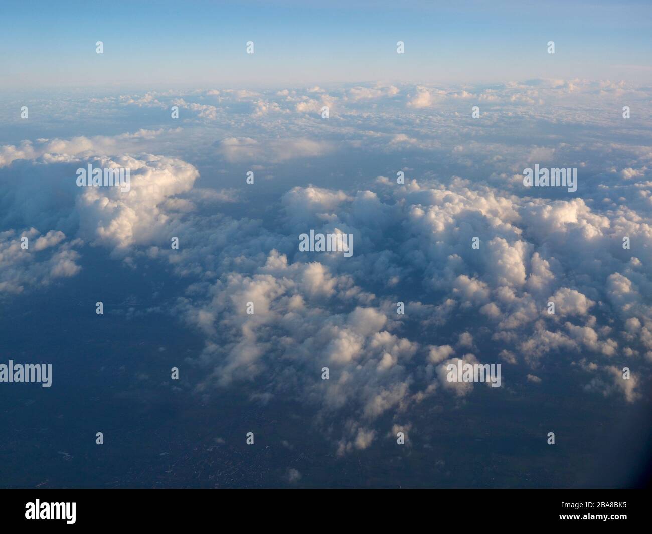 Little clouds over Spain, Europe seen from an aeroplane Stock Photo