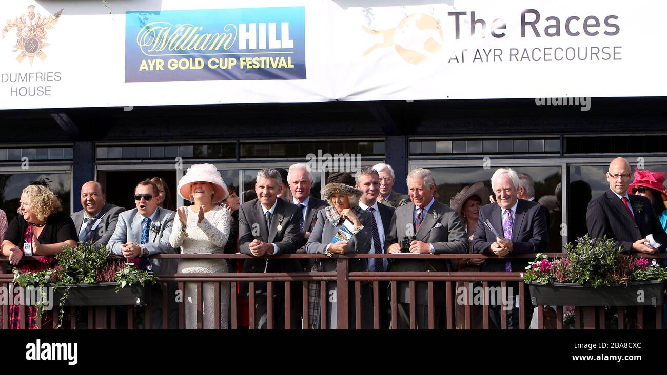 The Prince of Wales and The Duchess of Cornwall attend Ladies' Day at the William Hill Ayr Gold Cup Stock Photo