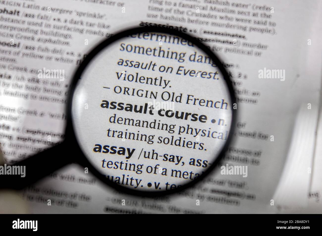 The word or phrase assault course in a dictionary book Stock Photo - Alamy