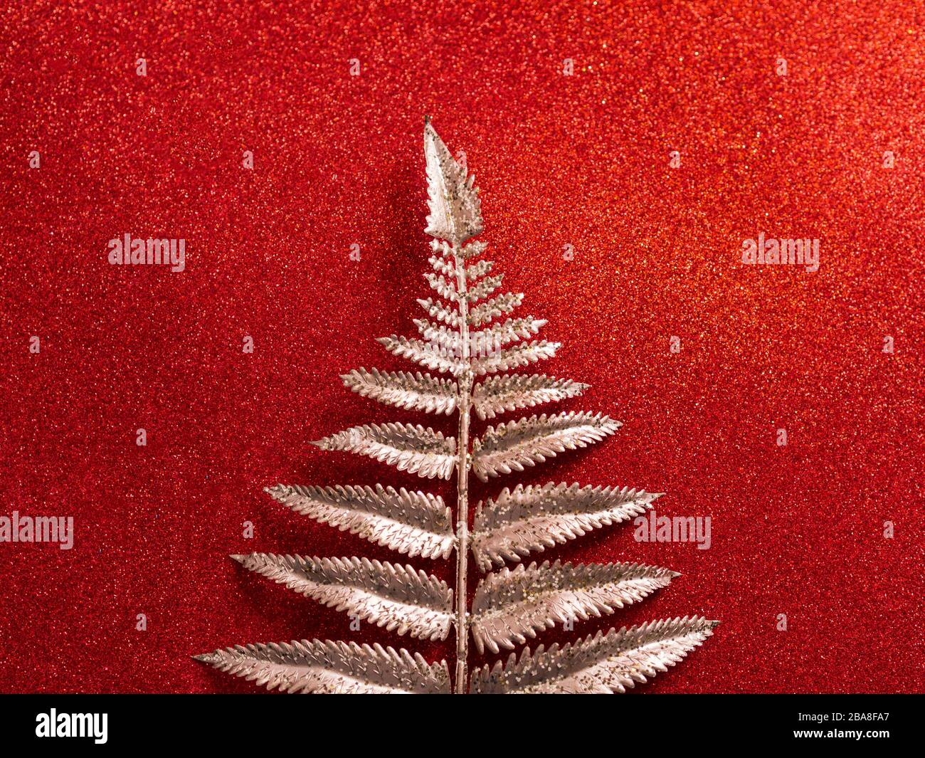 Glitter shiny red background with golden branch Stock Photo - Alamy