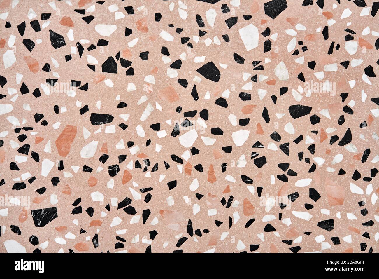 Closeup view at stone wall with geometric patterns Stock Photo