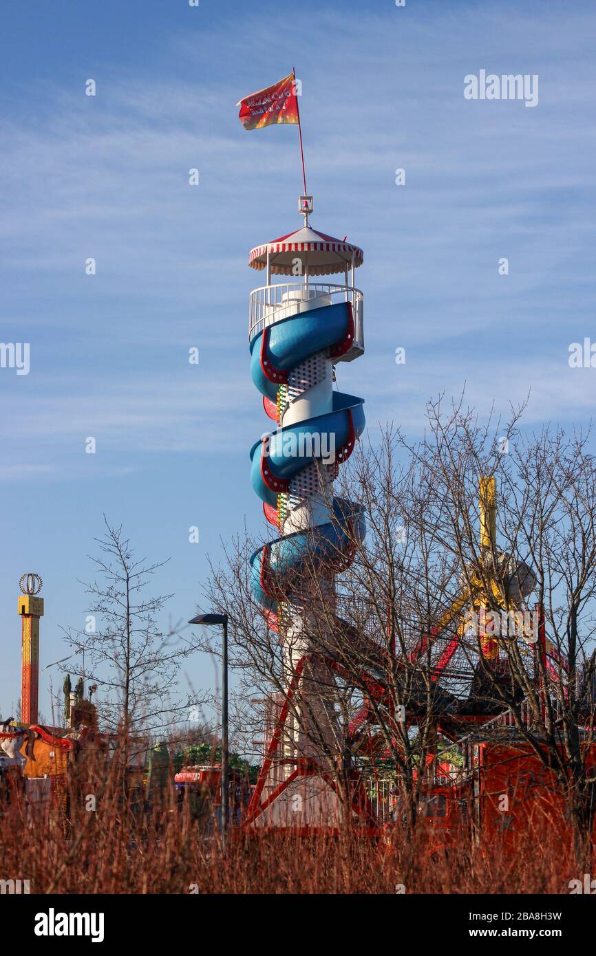 Travelling carnival amusement rides on an early spring day Stock Photo