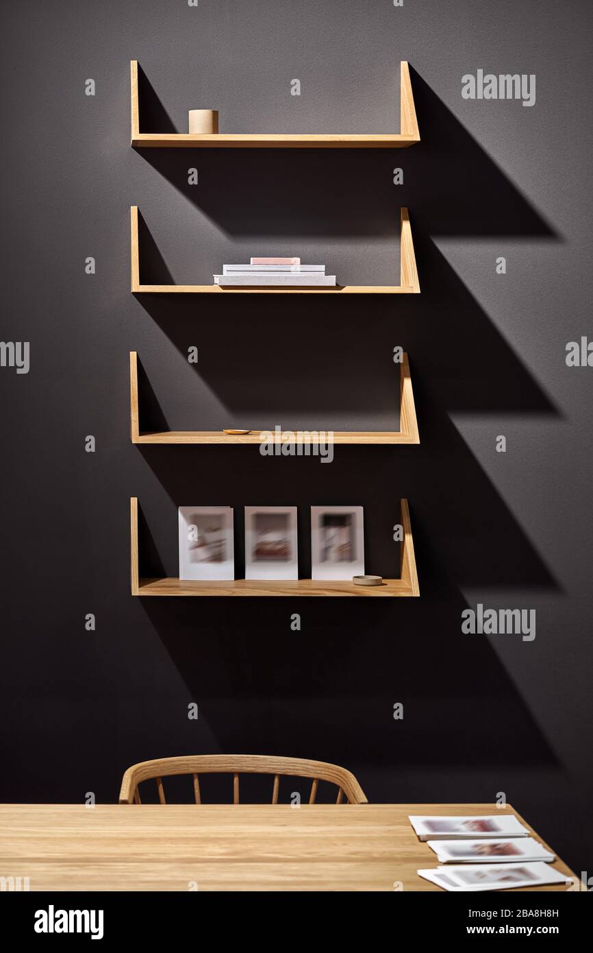 Luminous interior with wooden shelves and furniture Stock Photo Alamy