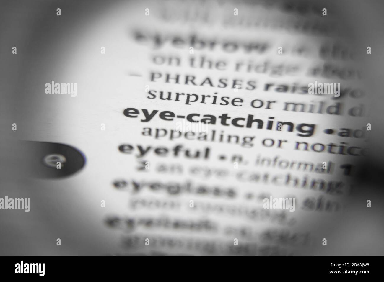 Word or phrase eyecatching in a dictionary. Great photo for your needs
