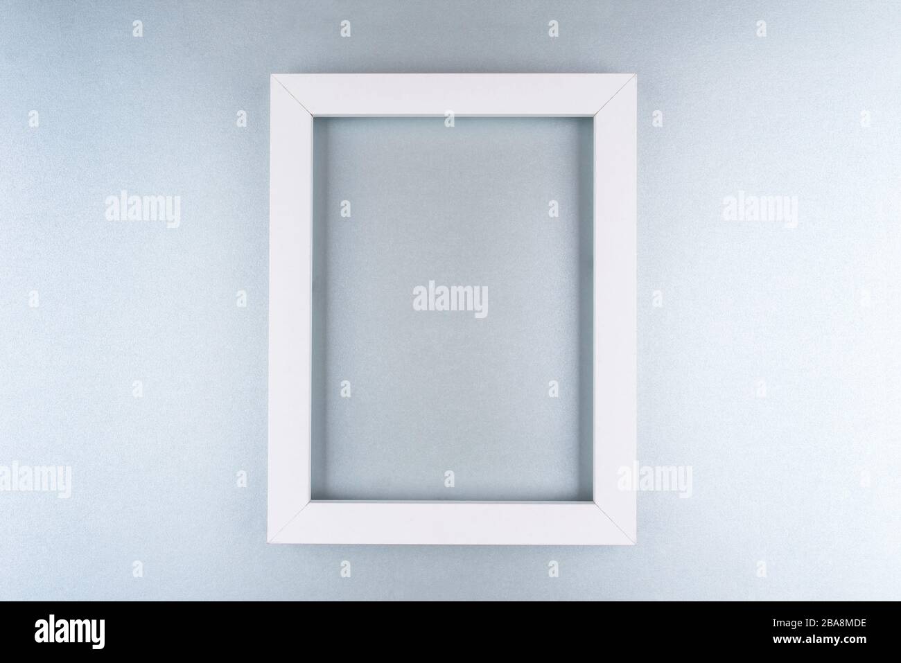 White text frame on a silver background. Stock Photo