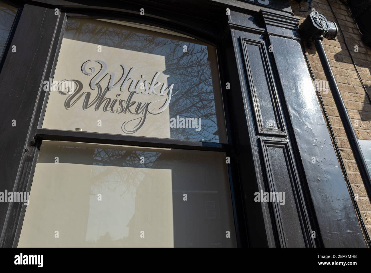 The word Whisky and reflection Stock Photo - Alamy