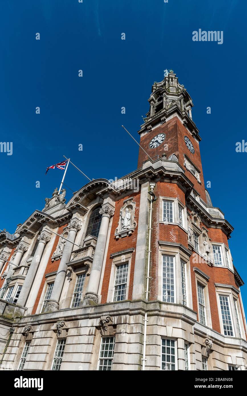 Colchester Town Hall bathed in early morning sunshine against a blue sky Stock Photo