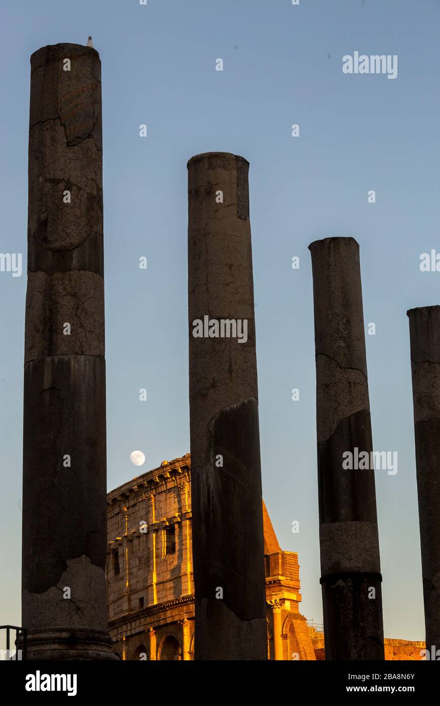 Moon over the Colosseum in Rome Stock Photo