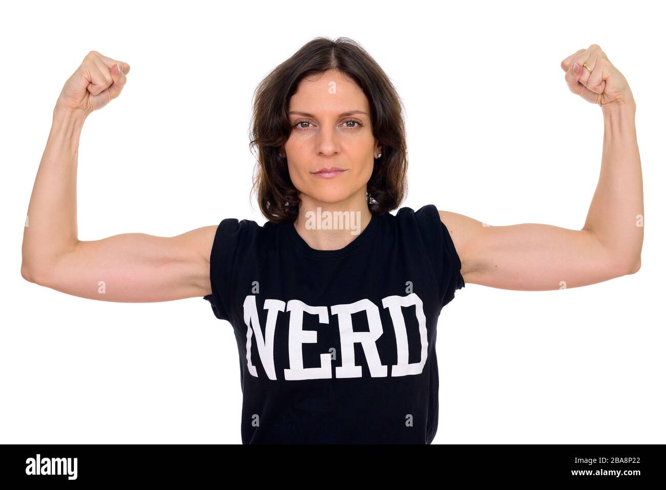 Portrait of beautiful nerd woman flexing muscles Stock Photo