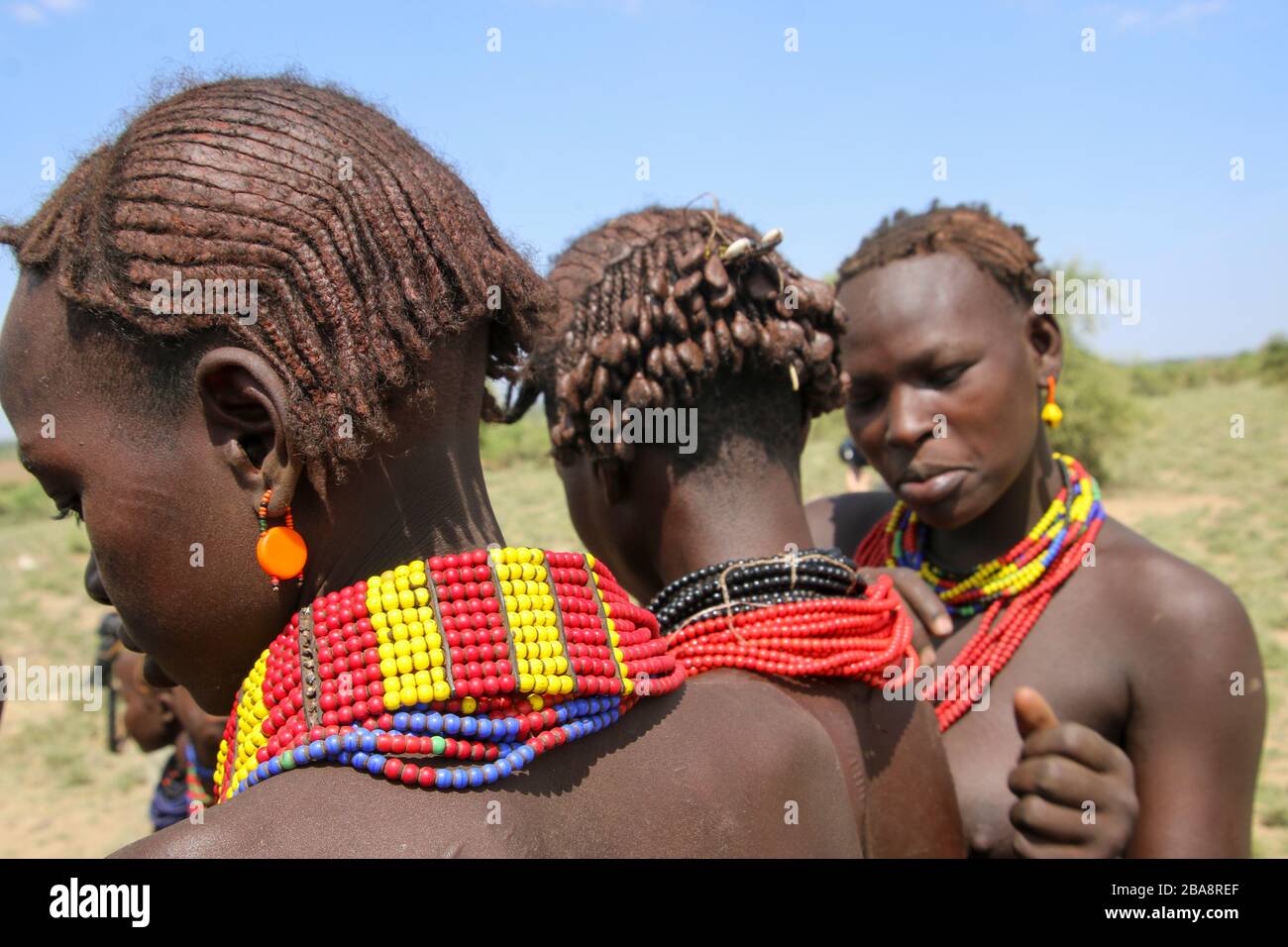 Portrait of a Daasanach tribe woman Close up on her ochre covered hair Photographed in the Omo Valley, Ethiopia Stock Photo