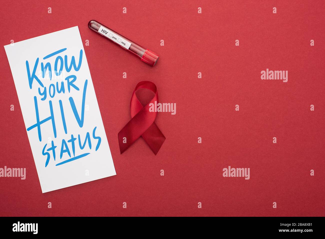 top view of card with know your HIV status lettering and awareness ...