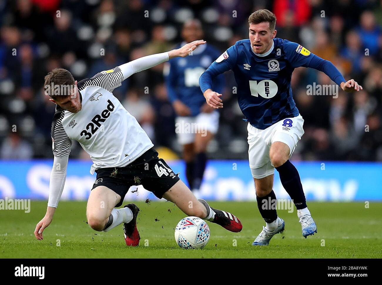 Derby County's Max Bird (left) and Blackburn Rovers' Joe Rothwell battle for the ball Stock Photo