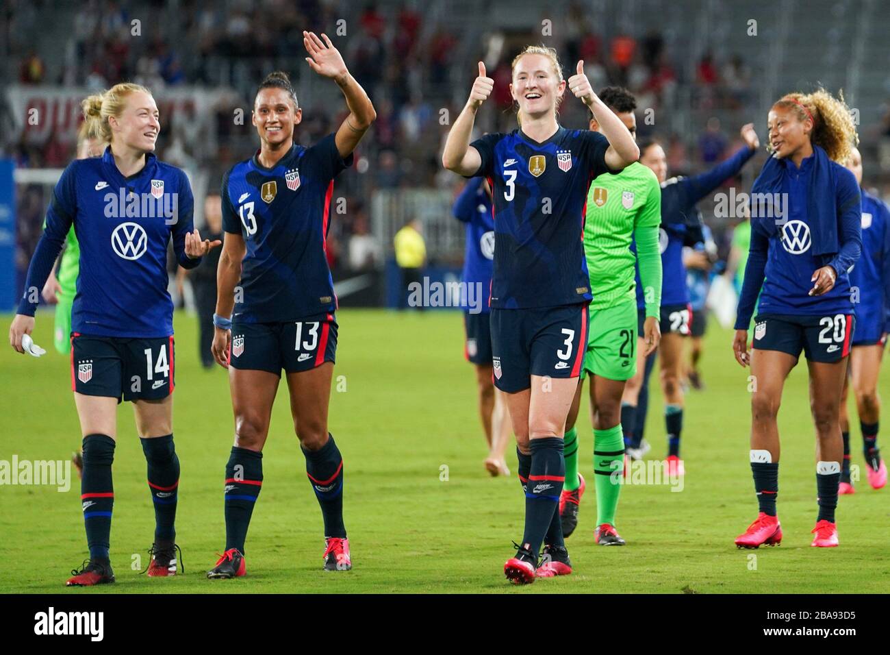 ORLANDO. USA. MAR 05: Emily Sonnett, Lynn Williams and Samantha Mewis of  the USA (left to right) thanking their fans during the 2020 SheBelieves Cup  Women's International friendly football match between USA