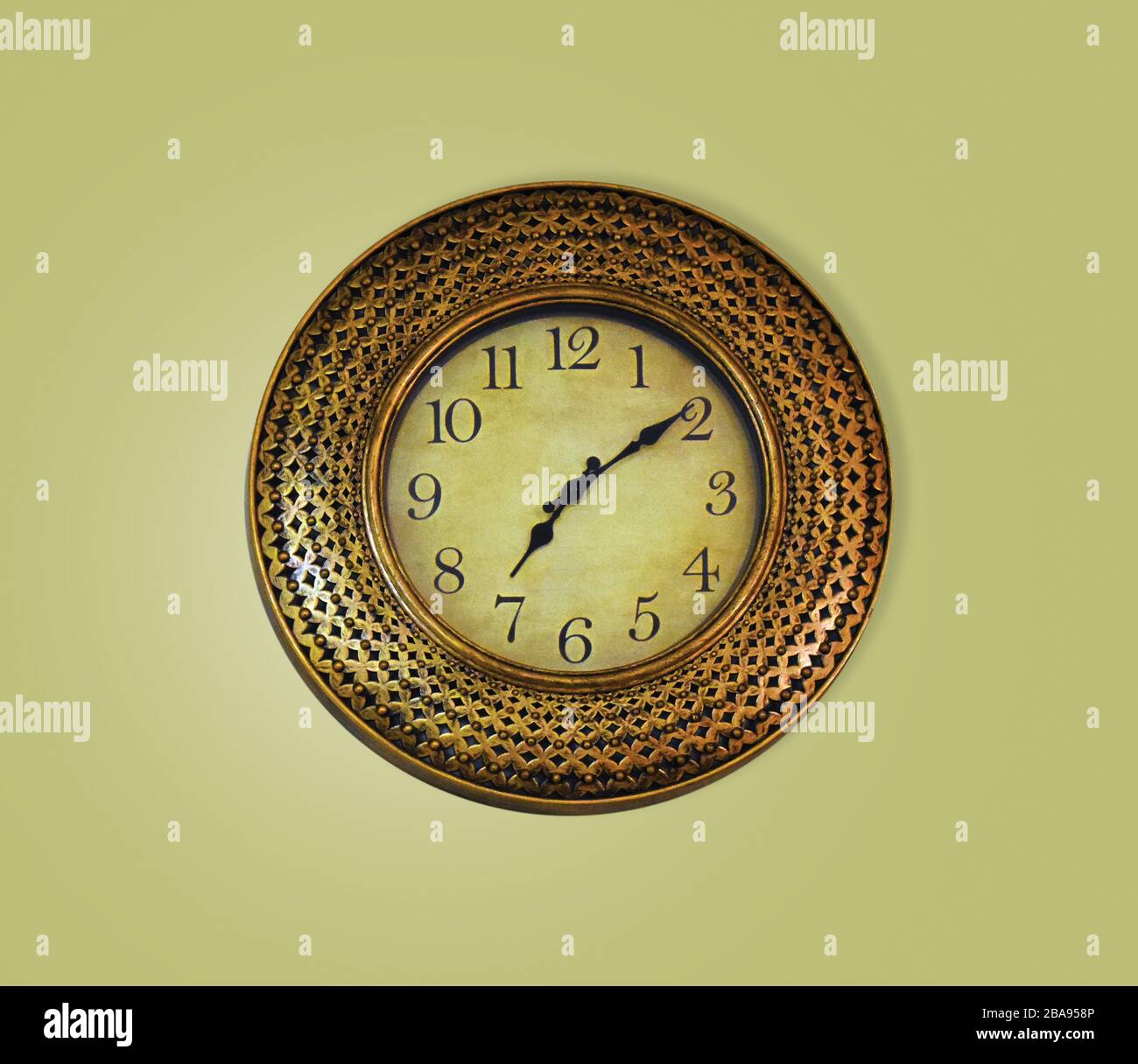 Vintage luxury golden wall clock isolated Stock Photo Alamy