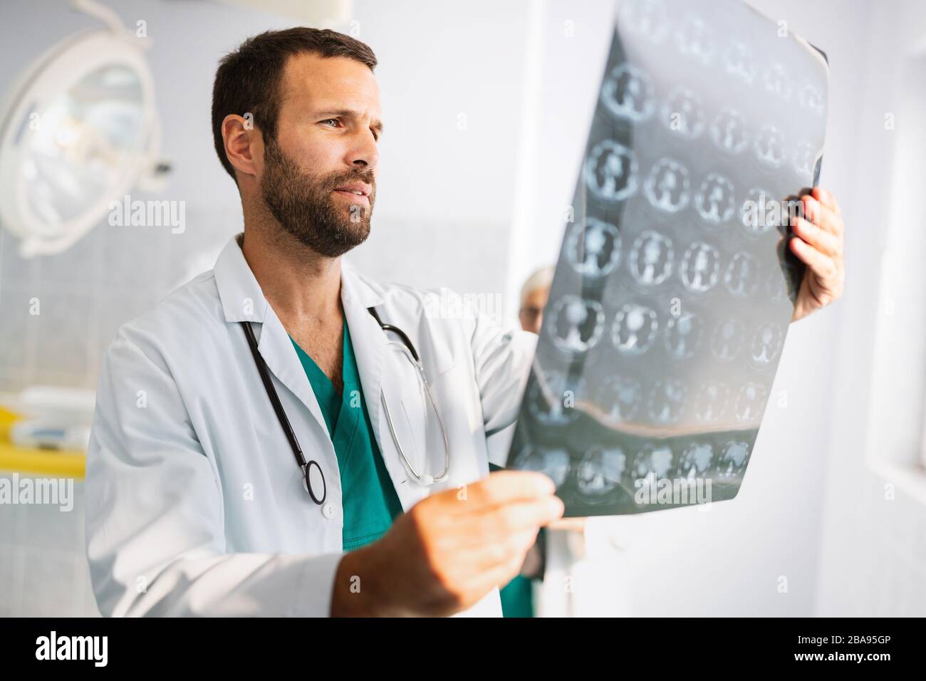 Handsome doctor hi-res stock photography and images - Alamy