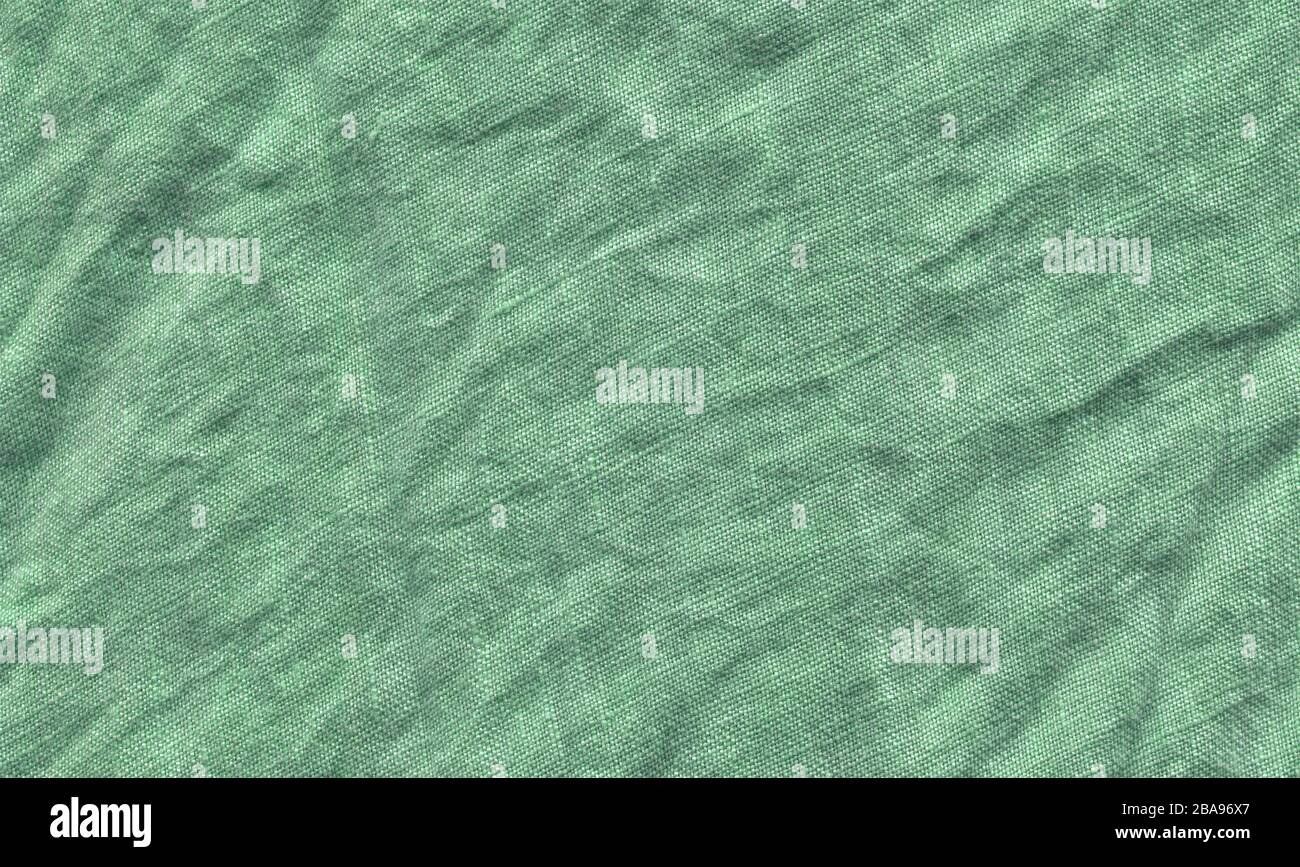 Turquoise fabric background texture. Turquoise background from a textile material Stock Photo