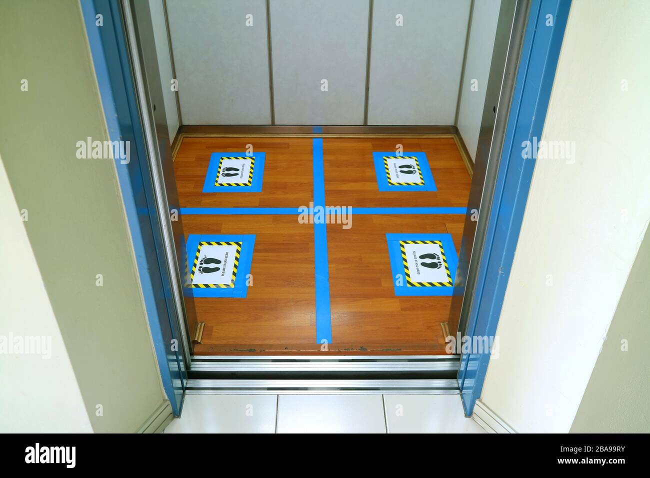 Floor marking of standing position in the elevator for social ...
