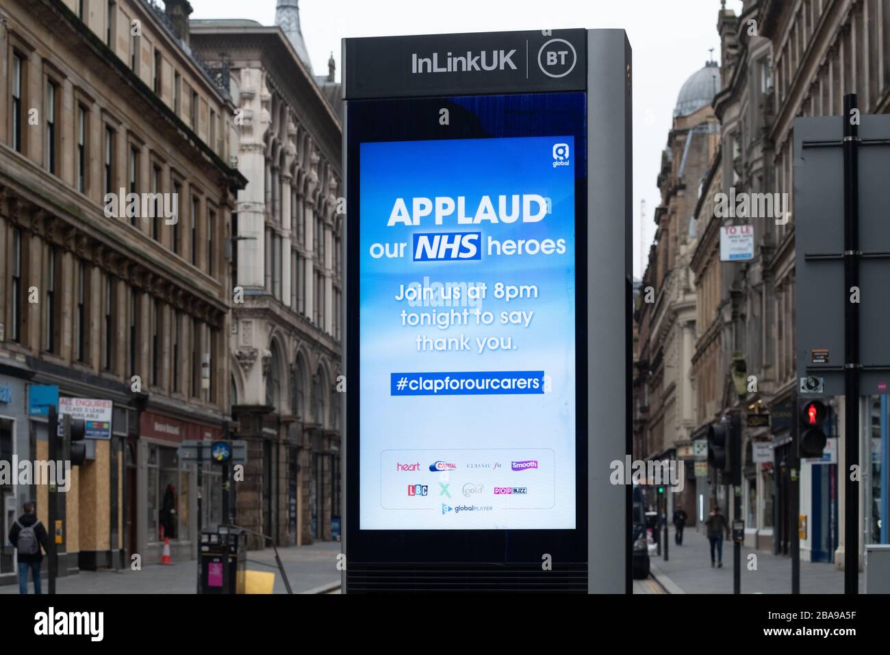 Glasgow, Scotland, UK. 26th Mar, 2020. Coronavirus lockdown Scotland - Applaud our NHS heroes sign in Glasgow city centre during the coronavirus lockdown, encouraging the public to clap on balconies, and at front doors at 8pm tonight Credit: Kay Roxby/Alamy Live News Stock Photo