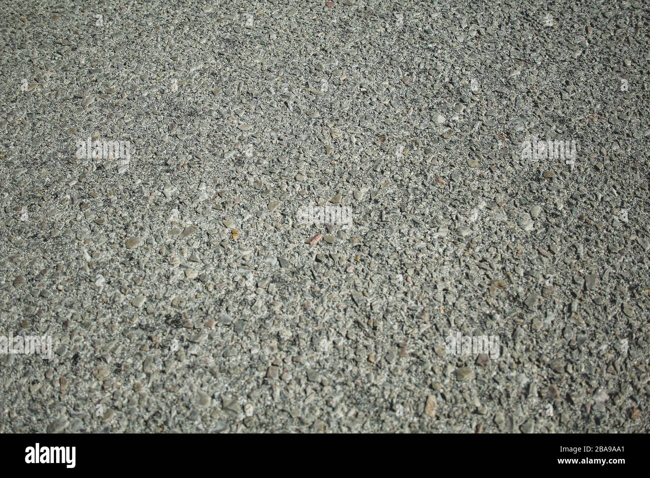 road texture - small grey stones surface Stock Photo