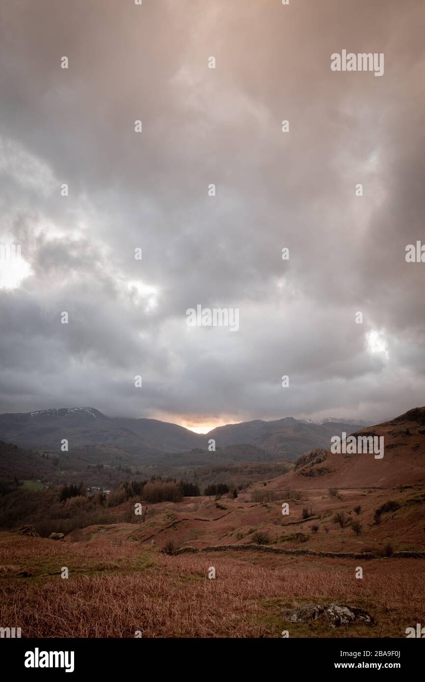 Sunset over Wrynose Pass from Loughrigg, Lake District, UK Stock Photo