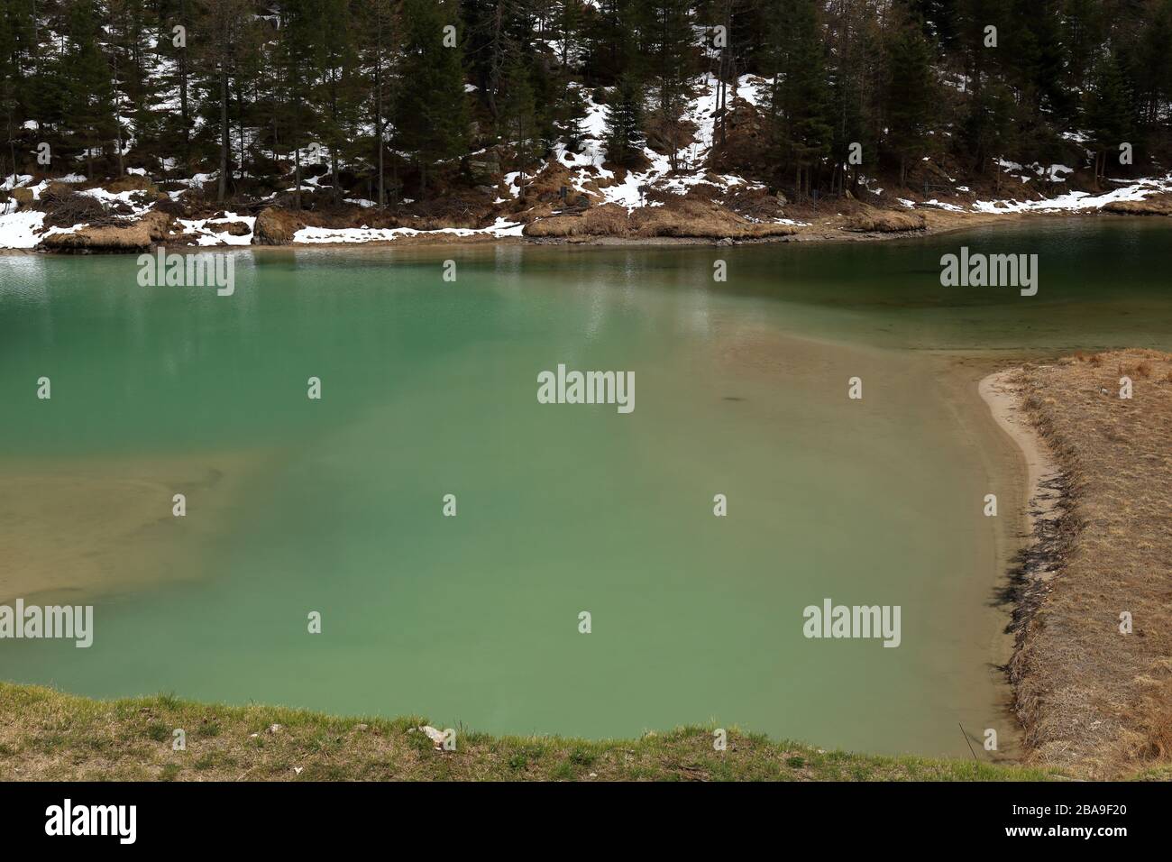 Panorama of Lago delle Fate, Macugnaga, Italy, with green water Stock Photo