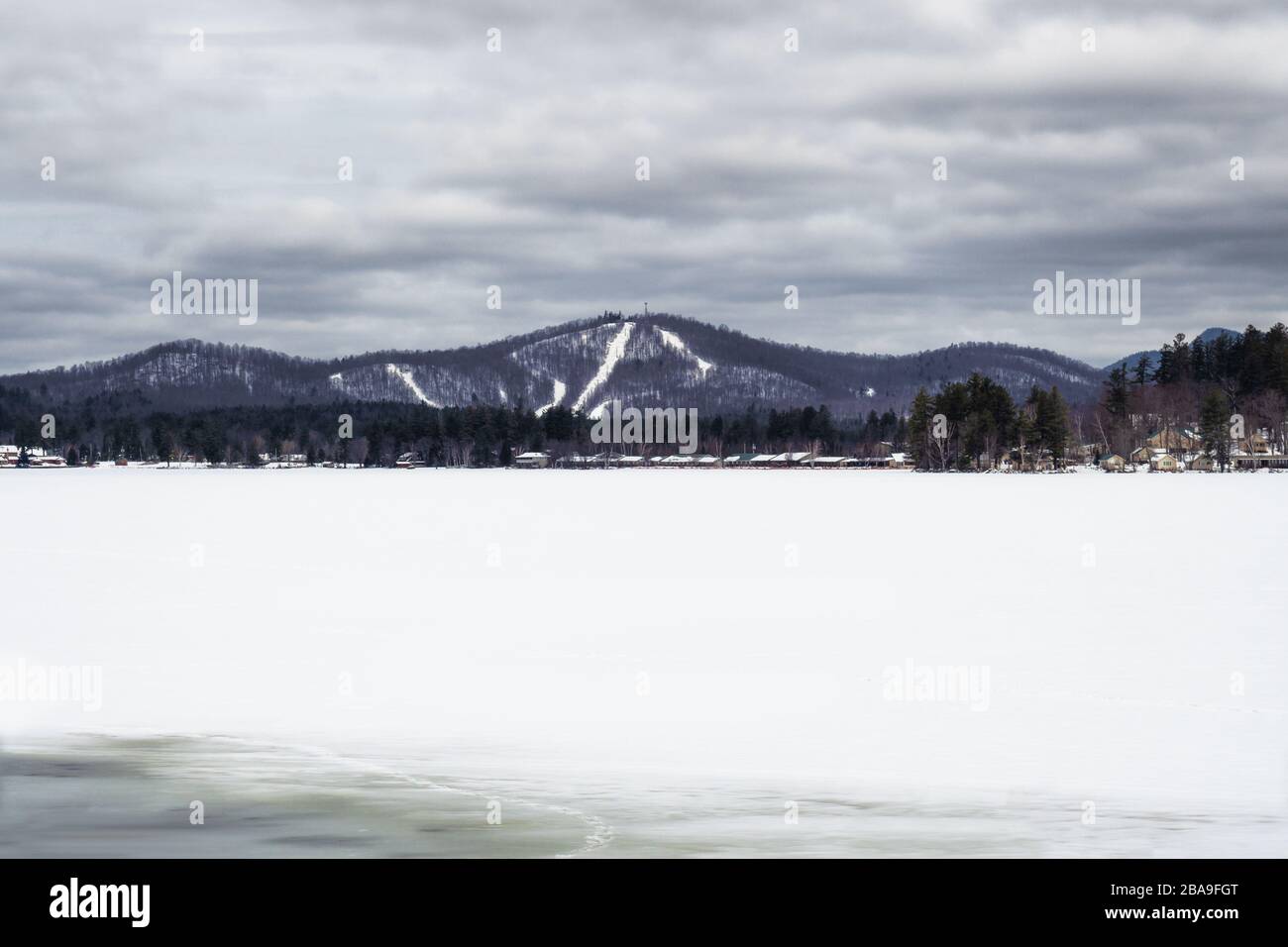 Quiet mountain landscape and frozen lake in The Adirondack Mountains of upstate New York Stock Photo