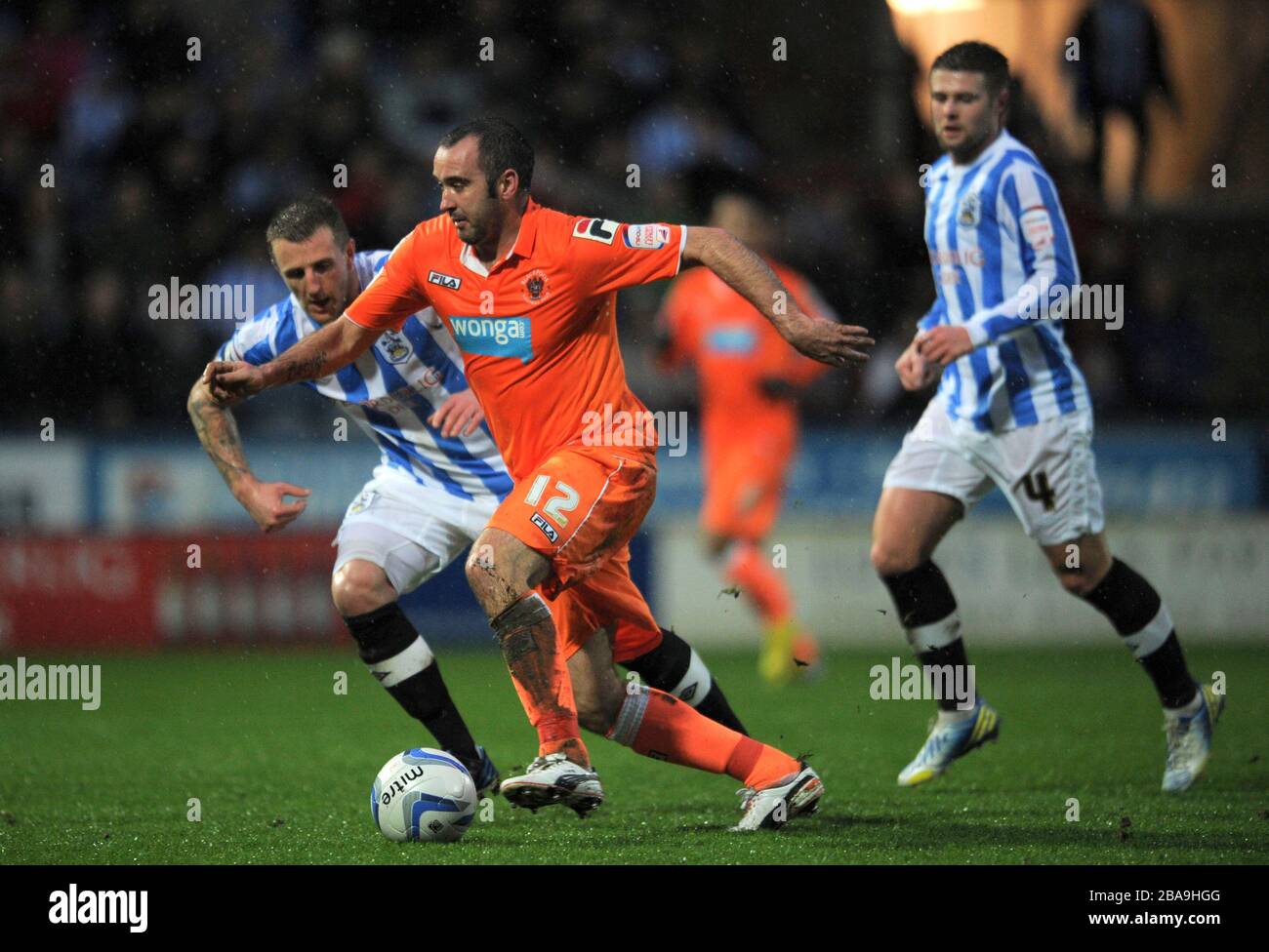 Huddersfield Town's Peter Clarke and Blackpool's Gary Taylor-Fletcher Stock Photo