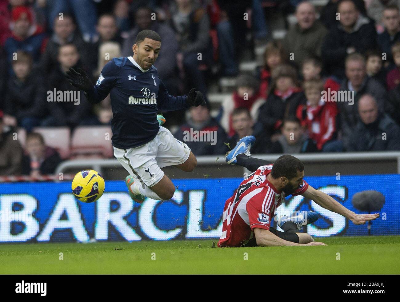 Sunderland's  Carlos Cuellar fouls Tottenham Hotspur's Aaron Lennon Stock Photo