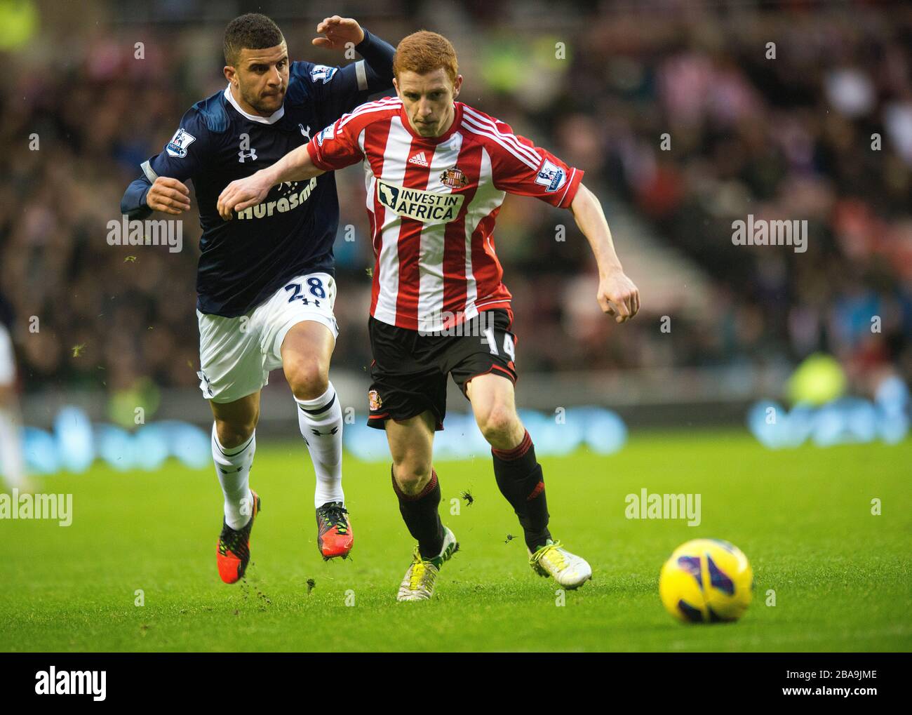 Sunderland's Jack Colback and Tottenham Hotspur's battle for the ball Stock Photo