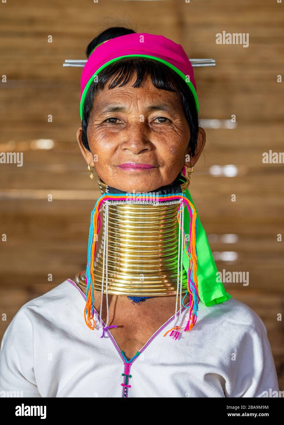 Portrait of Padaung woman in traditional dress and with metal rings around her neck. February 12, 2019, Myanmar. Stock Photo
