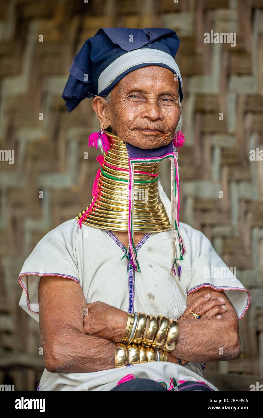 Portrait of an old Padaung woman in traditional dress and with metal rings around her neck. February 12, 2019, Myanmar. Stock Photo