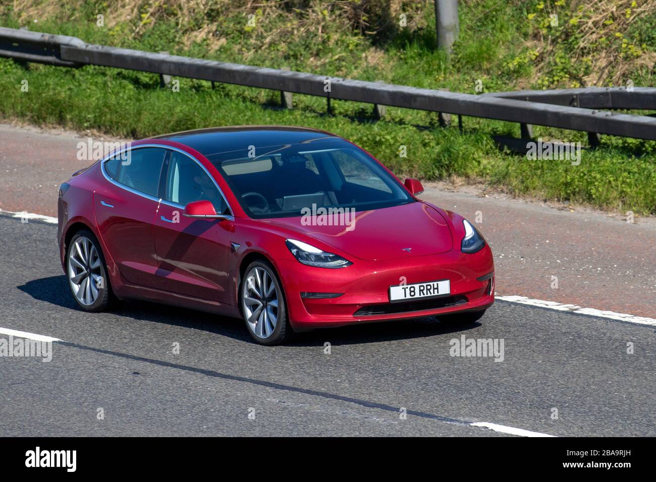 Electric car driving uk roads hi-res stock photography and images - Alamy