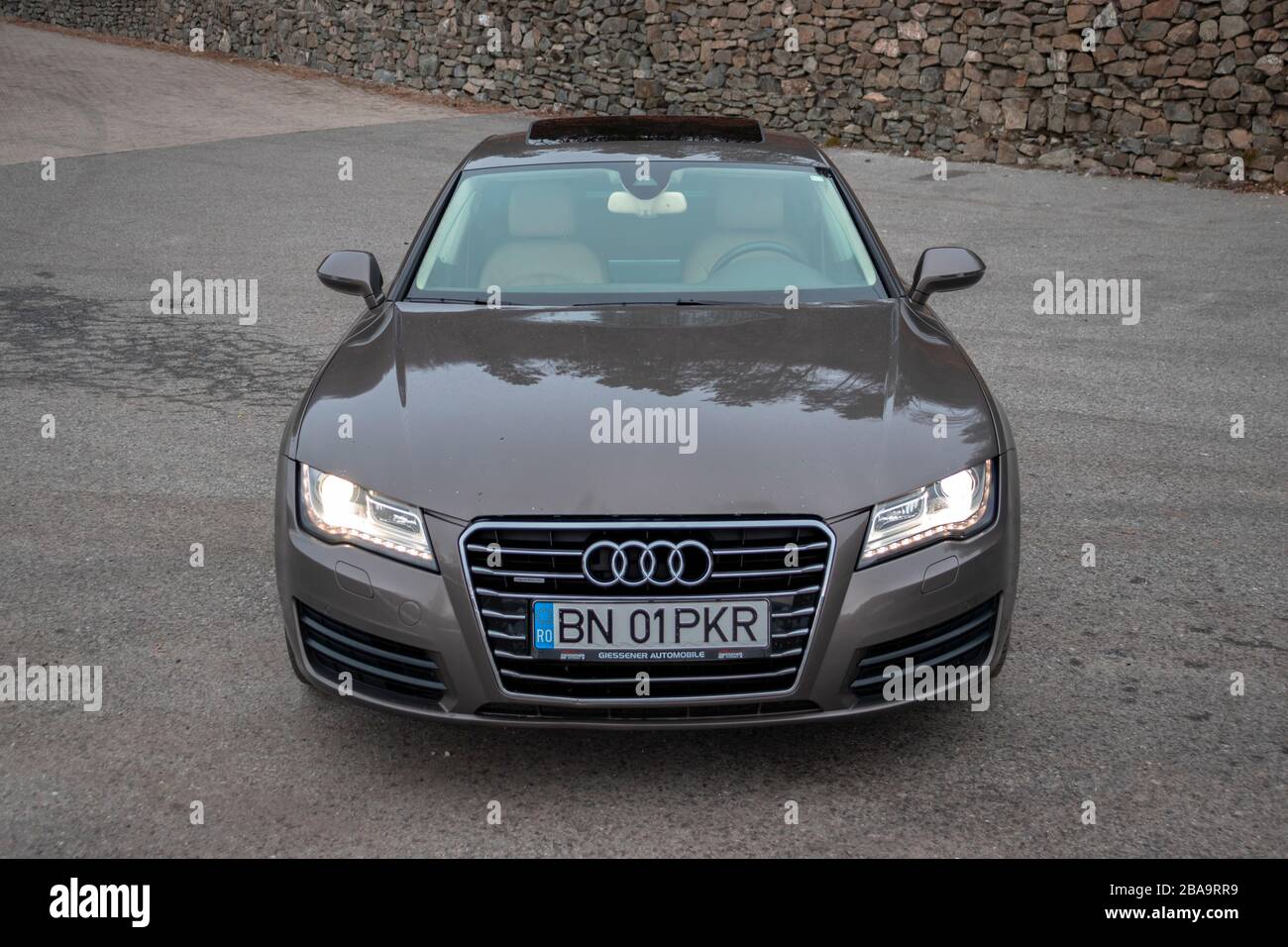 Close up photo of front side Audi A7 sports car with matrix led  headlights,quatro emblem,black privacy windows and chrome ornaments,  isolated Stock Photo - Alamy