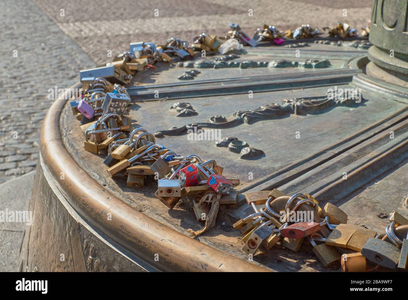 Plaza Mayor, Madrid, Spain; September 16 2018: Large number of locks of different shapes and colors closed between them Stock Photo
