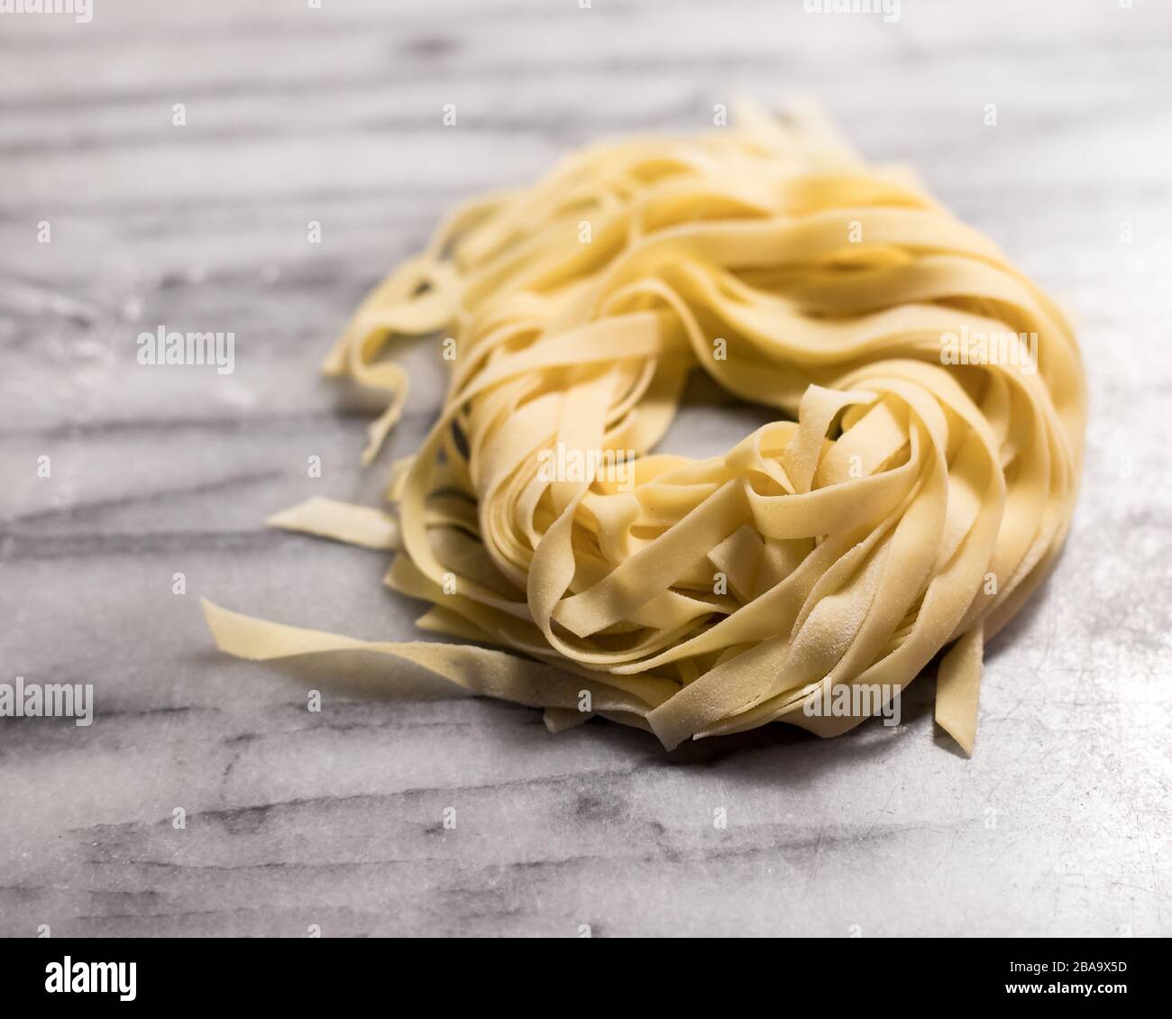 Pile of Fresh Fettuccine Pasta Noodles Stock Photo Alamy