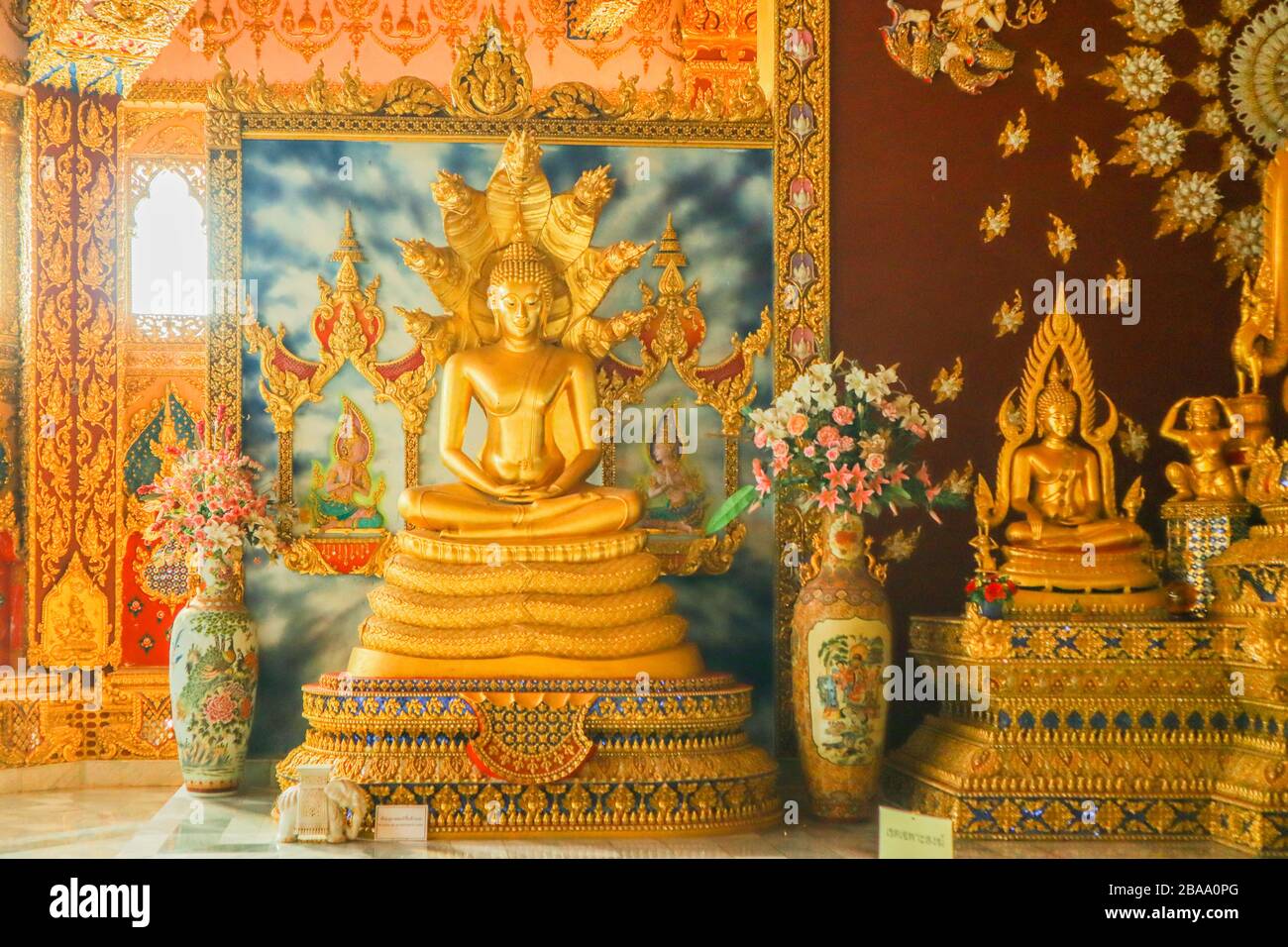 Golden Statue of Buddha in a Buddhist temple Stock Photo - Alamy