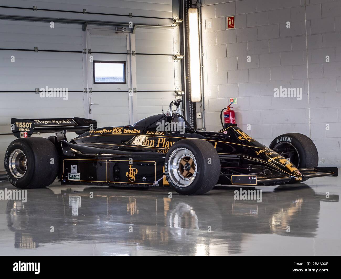 A 1982 JPS Lotus 91/7 F1 racing car driven by Katsu Kubota at Silverstone racing circuit, Towcester, Northamptonshire, UK 2019 Stock Photo