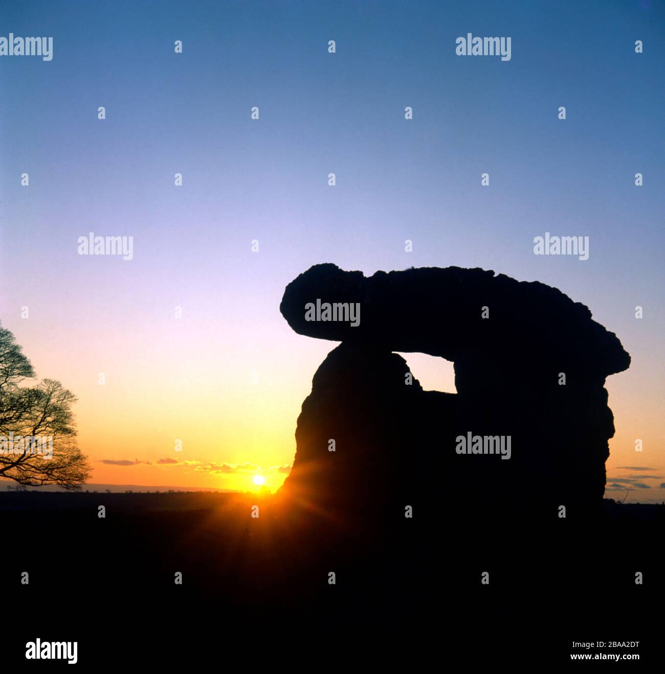 Sunset and Maes Y Felin Burial Chamber, St Lythans, Vale of Glamorgan, S. Wales Stock Photo