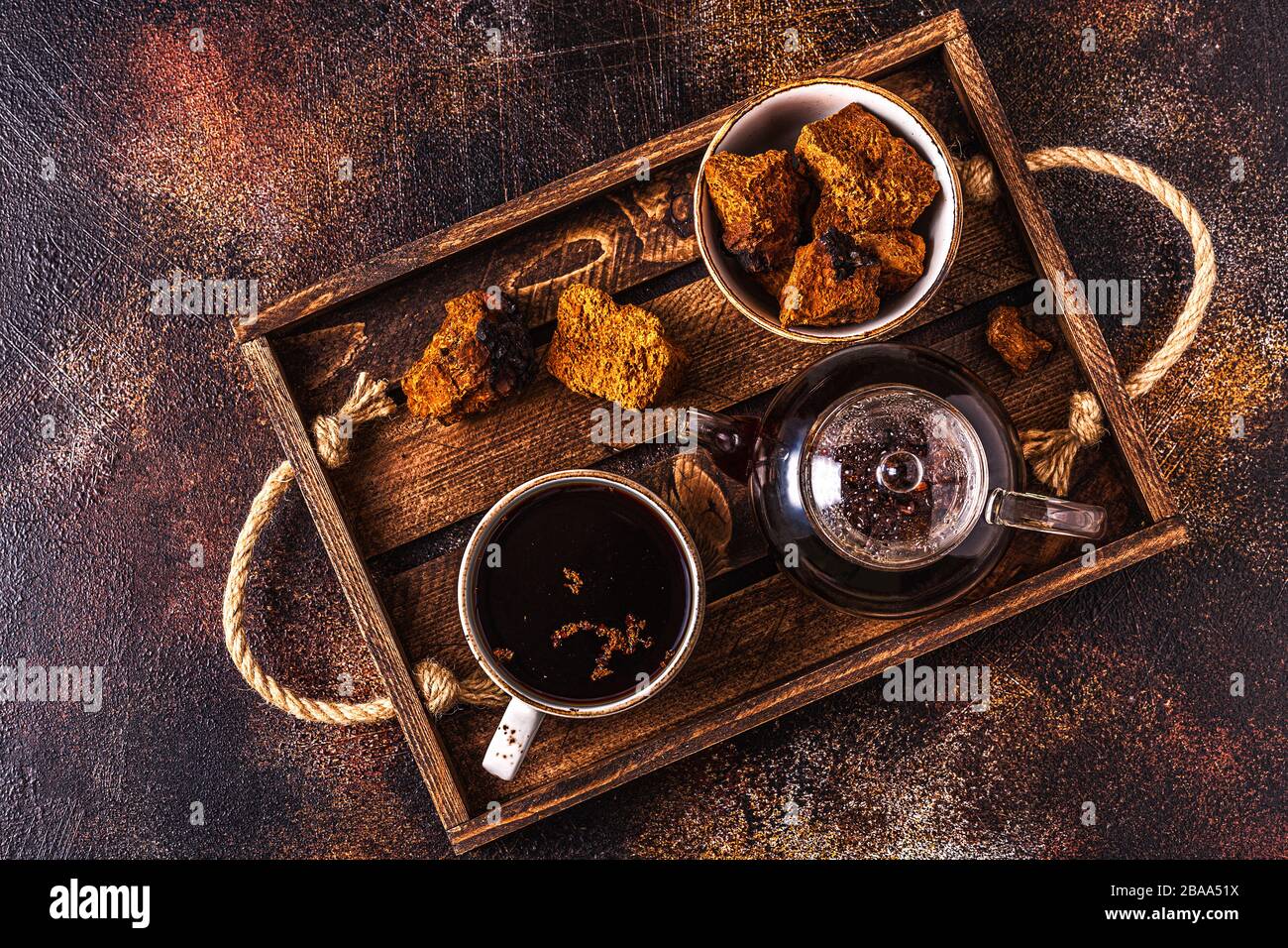 Chaga tea - a strong antioxidant, boosts immune system, has detox quality, improves digestive. Stock Photo