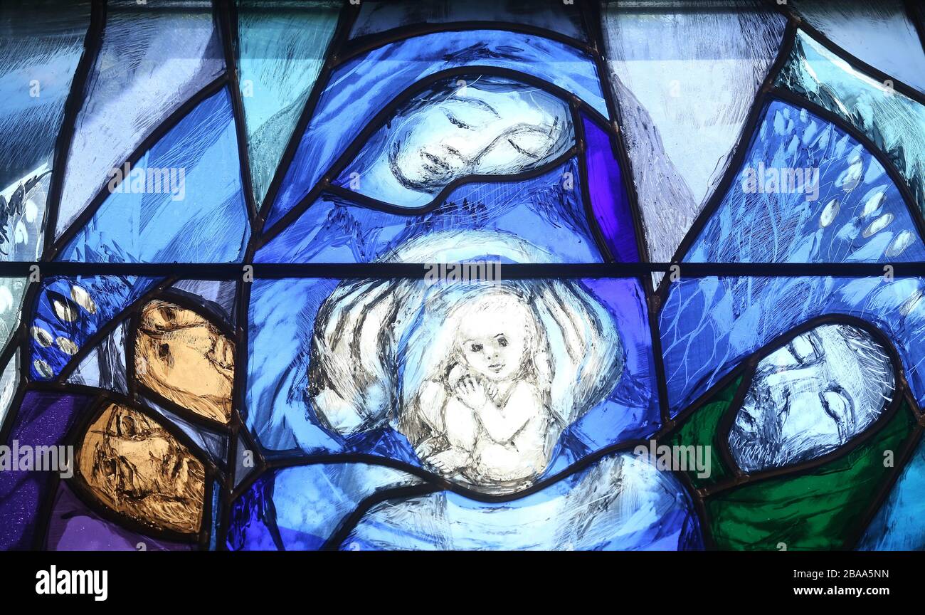 God, the Creator of all life, detail of stained glass window by Sieger Koder in church of Saint John in Piflas, Germany Stock Photo