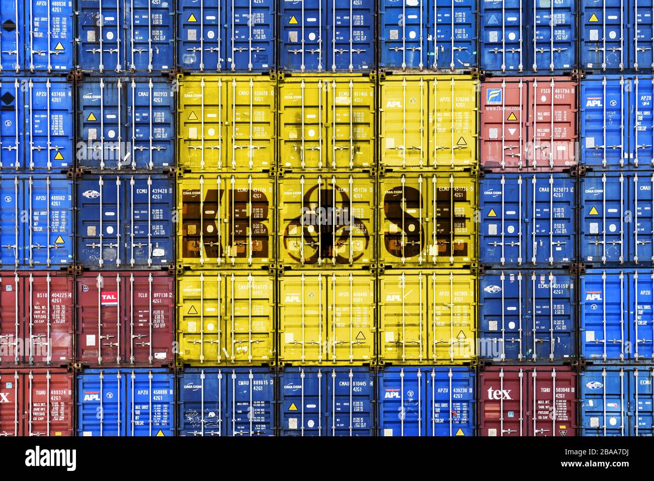 PHOTOMONTAGE, stacked containers with stroke crisis and biology danger sign, subject Coronakrise and economy, FOTOMONTAGE, Gestapelte Container mit Sc Stock Photo