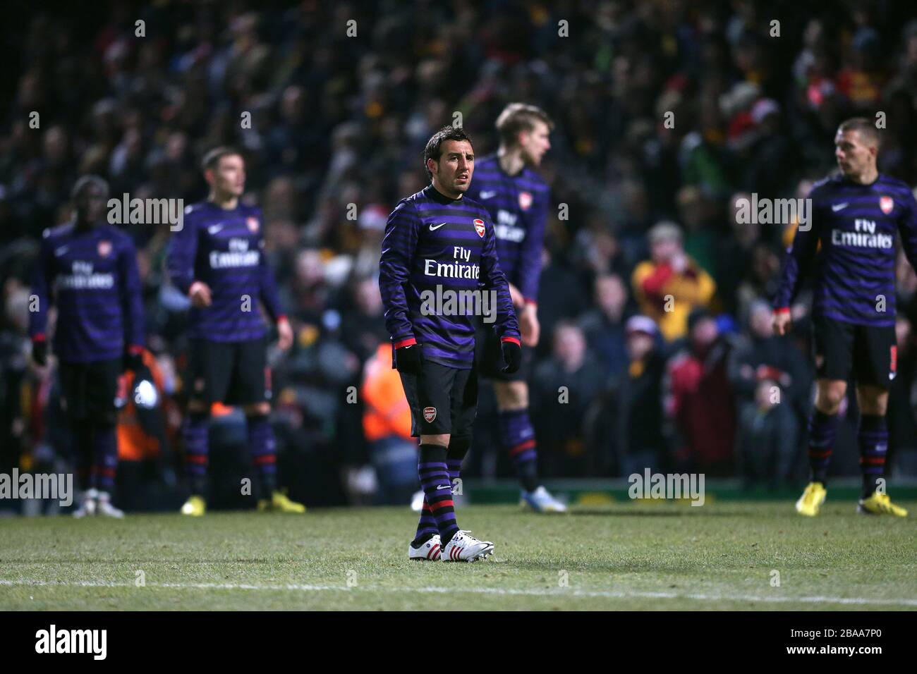 Arsenal's Santi Cazorla and teammates stand dejected Stock Photo