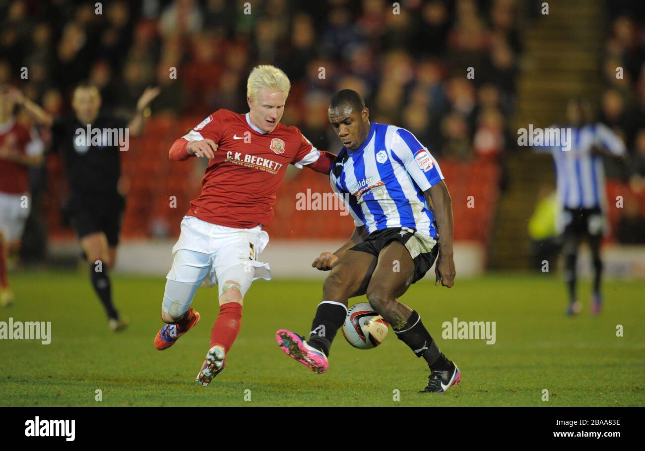 Barnsley's David Perkins challenges Sheffield Wednesday's Michall Antonio Stock Photo