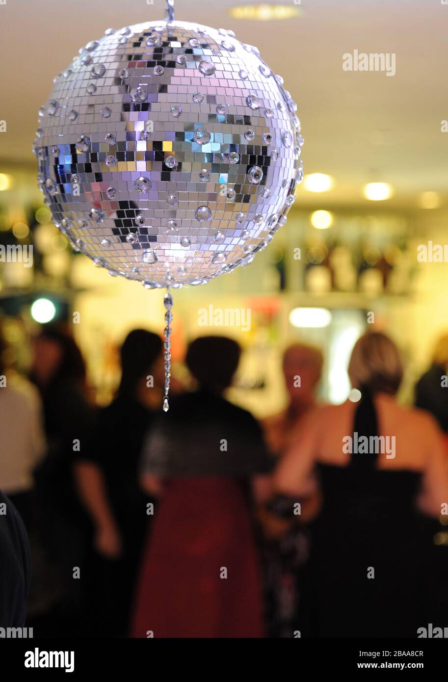 A view of a glitter ball in the drinks reception area of the Queen's