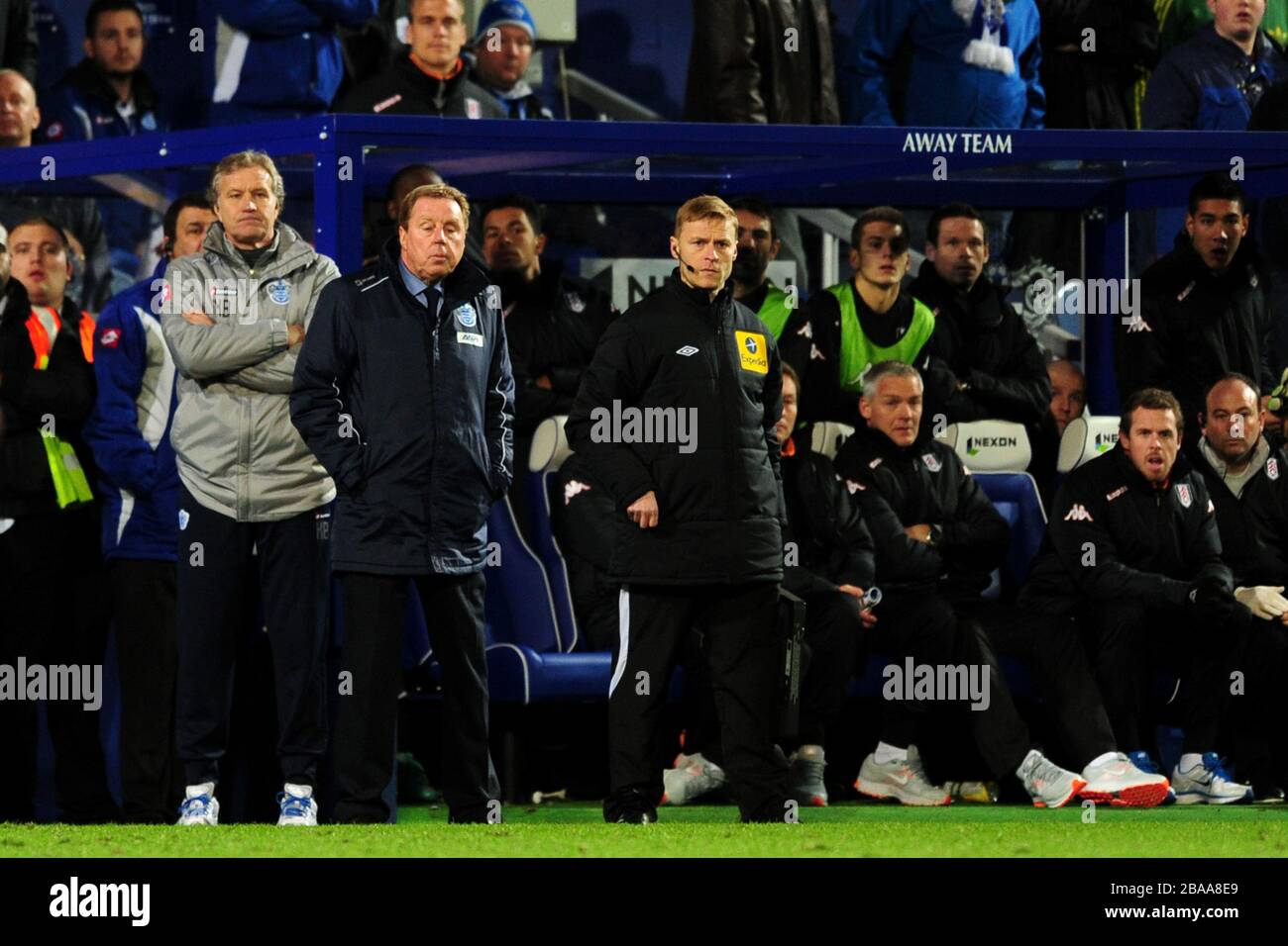 Queens Park Rangers manager Harry Redknapp and his assistant Kevin Bond (left) on the touchline Stock Photo
