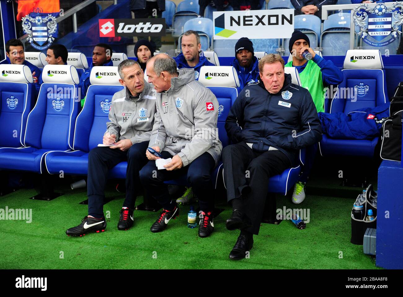(left to right) Queens Park Rangers goalkeeping coach Kevin Hitchcock, first team coach Joe Jordan and manager Harry Redknapp Stock Photo