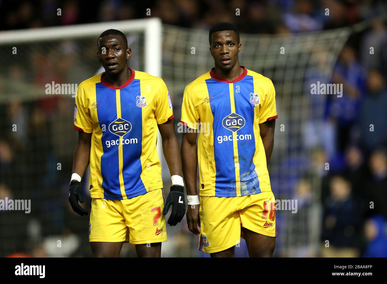Crystal Palace's Yannick Bolasie (left) and Wilfried Zaha form a defensive wall Stock Photo