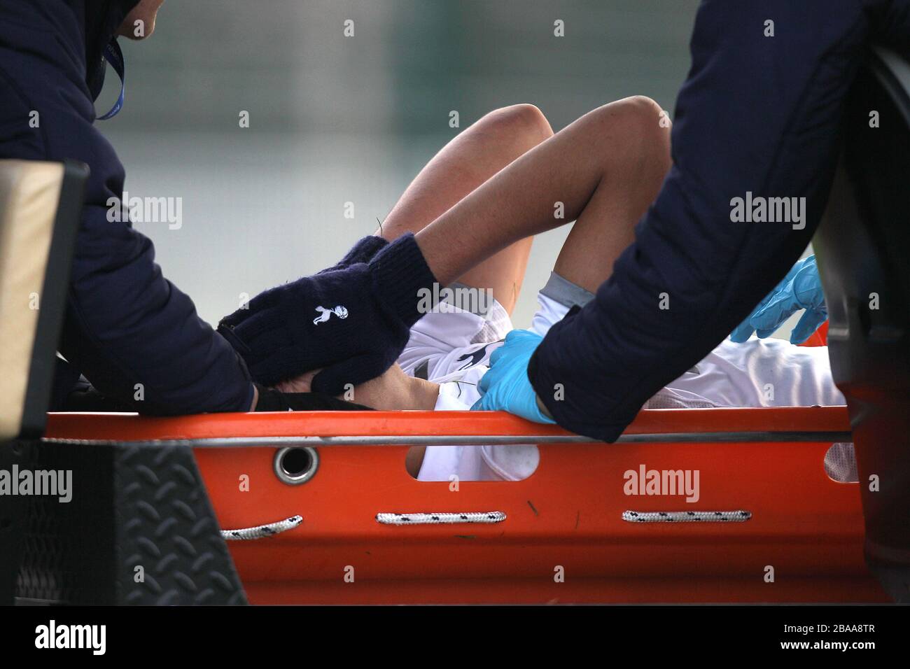 Tottenham Hotspur's Nabil Bentaleb is stretchered off with an injury Stock Photo